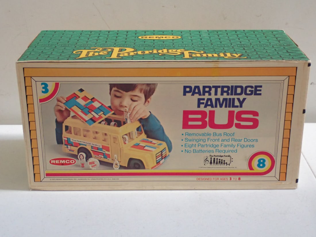 1973 Partridge Family Bus Remco in Box: Molded Plastic Bus . Paper Labels Include Shirley, Keith, Laurie, Penny, Chris and Tracy. Has Guitar and Drums. Bus has a little wear. Has some scuffing on bus grill. Figures are in plastic bag. Some