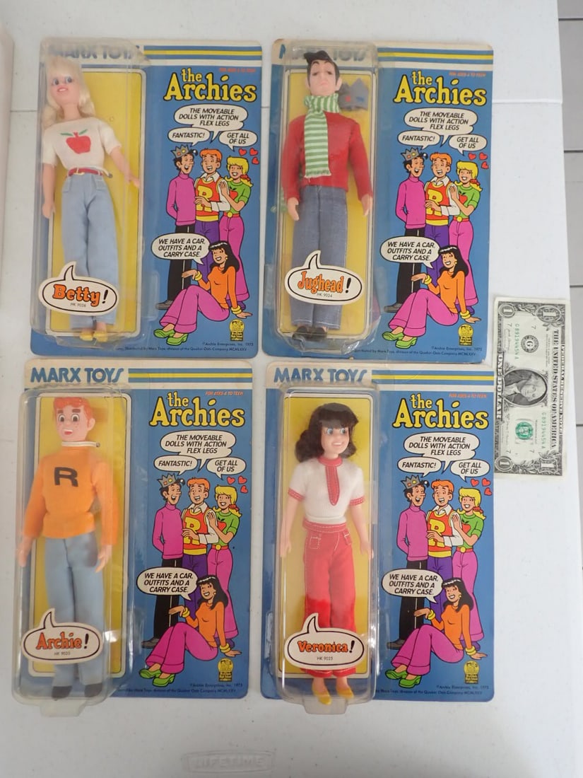 (4) 1975 Marx Toys The Archies Action Figures MOC: Jughead - HK 9024, Archie -HK 9023, Veronica - HK 9025, Betty - HK 9026. Distributed by Marx Toys, Division of the Quaker Oats Company Archie Enterprises, Inc. Figures on cards. Cardboard has some sta