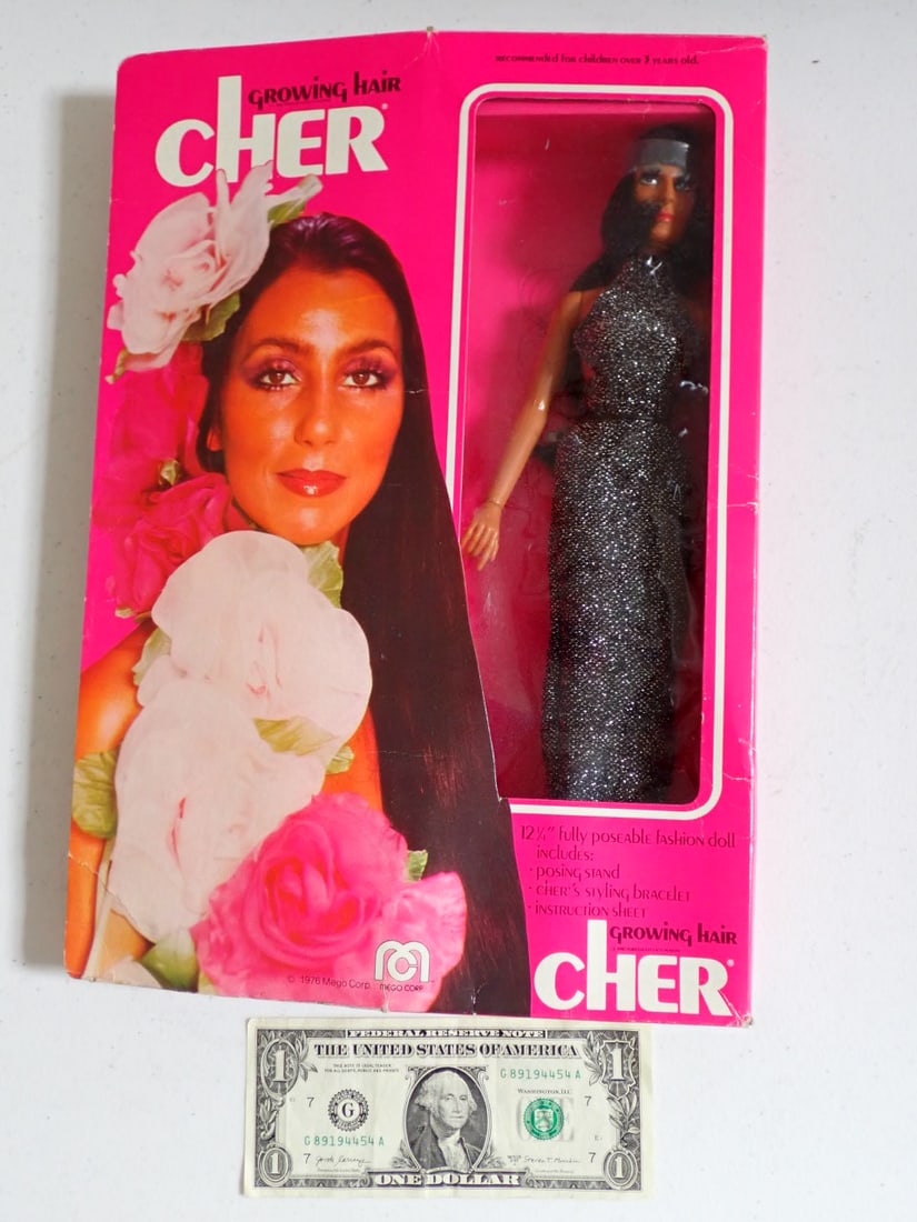 Vintage 1976 Mego Growing Hair Cher 12" with Box: Poseable Doll. Tape Missing on Top, but sealed on bottom. Doll in Mint condition but box has some wear with a little creasing and a tear