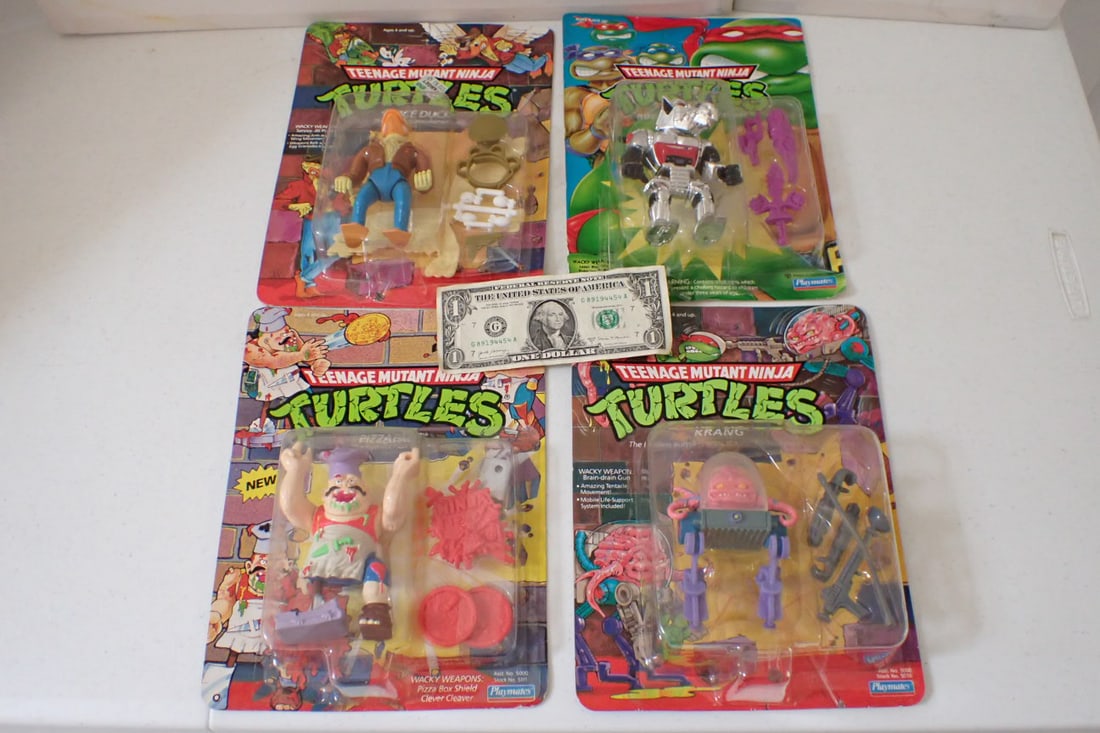 (4) 1990's Teenage Mutant Ninja Turtles Action Figures on Cards (1 of 9)