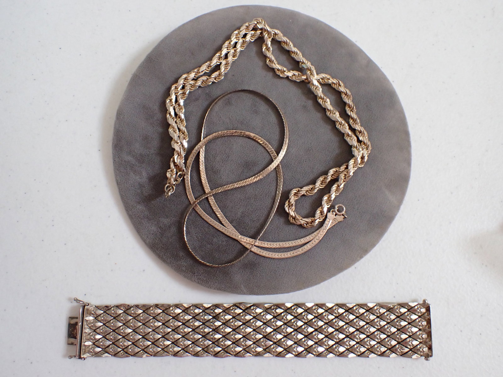 Sterling 925 24" Heavy Chain, 8" Bracelet and 24" Chain: Bracelet is 1 1/8" wide, Chain is Serpentine. We added a bracelet to this lot. Total weight is 6 ounces. See picture on end for additional bracelet. It is marked Mex14.