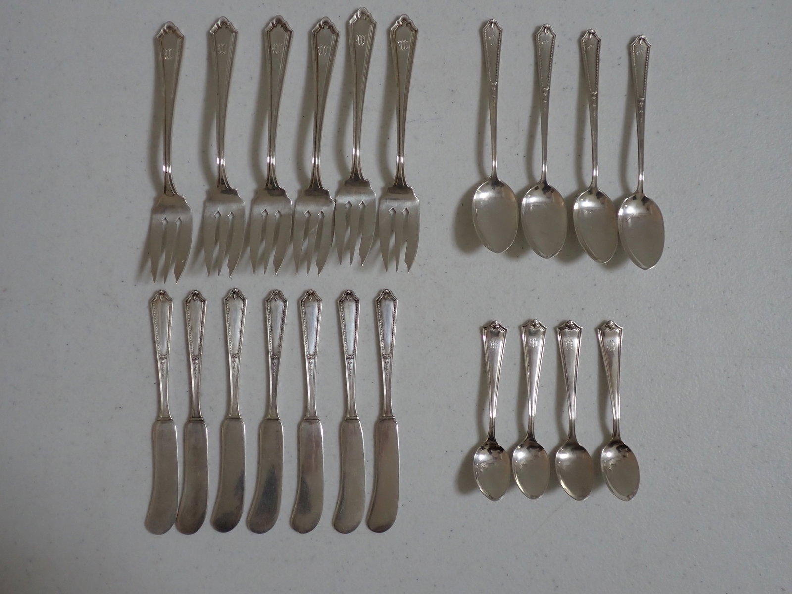 Alvin Sterling Luncheon Flatware: 6 Forks 6" long, 4 spoons 5", (4) 4" Demitasse spoons, 11 small butter Knives 5 1/2". 7.4 Troy Ounces.