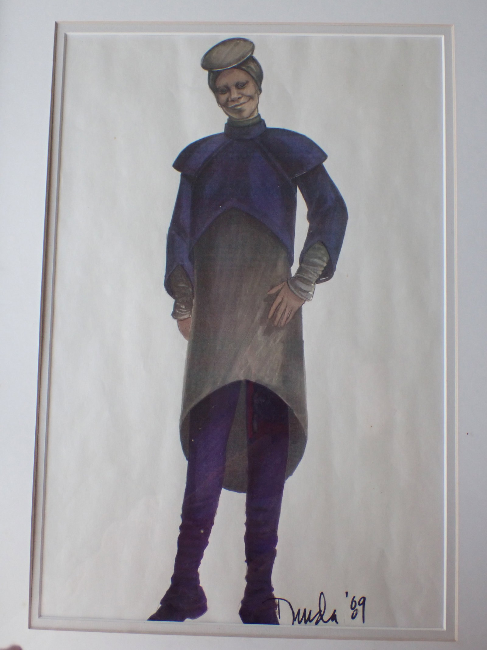 Whoopie Goldberg Star Trek Designer Sketch 1989 - Guiman: Whoopie Goldberg as Guiman Star Trek Costume Sketch Signed by Designer. Dated 1989. Frame: 21" x 16" - Art: 16" x 10 1/2". Light Frame Wear and some small spots on Mat. Otherwise Good Condition.