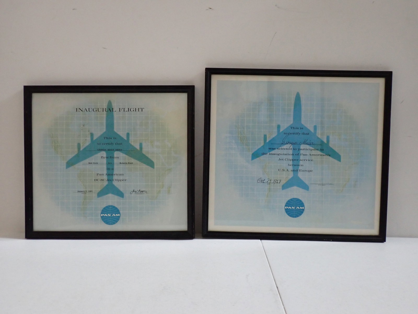 Two Pan Am Jet Clipper Inaugural Flight Certificates.: Oct. 23, 1958 Inaugural Jet Clipper Flight Between USA & Europe Certificate. Frame: 14 3/4" x 16". 1961 Inaugural Certificate for DC-8C Jeft Clipper Flight 13" x 16".
