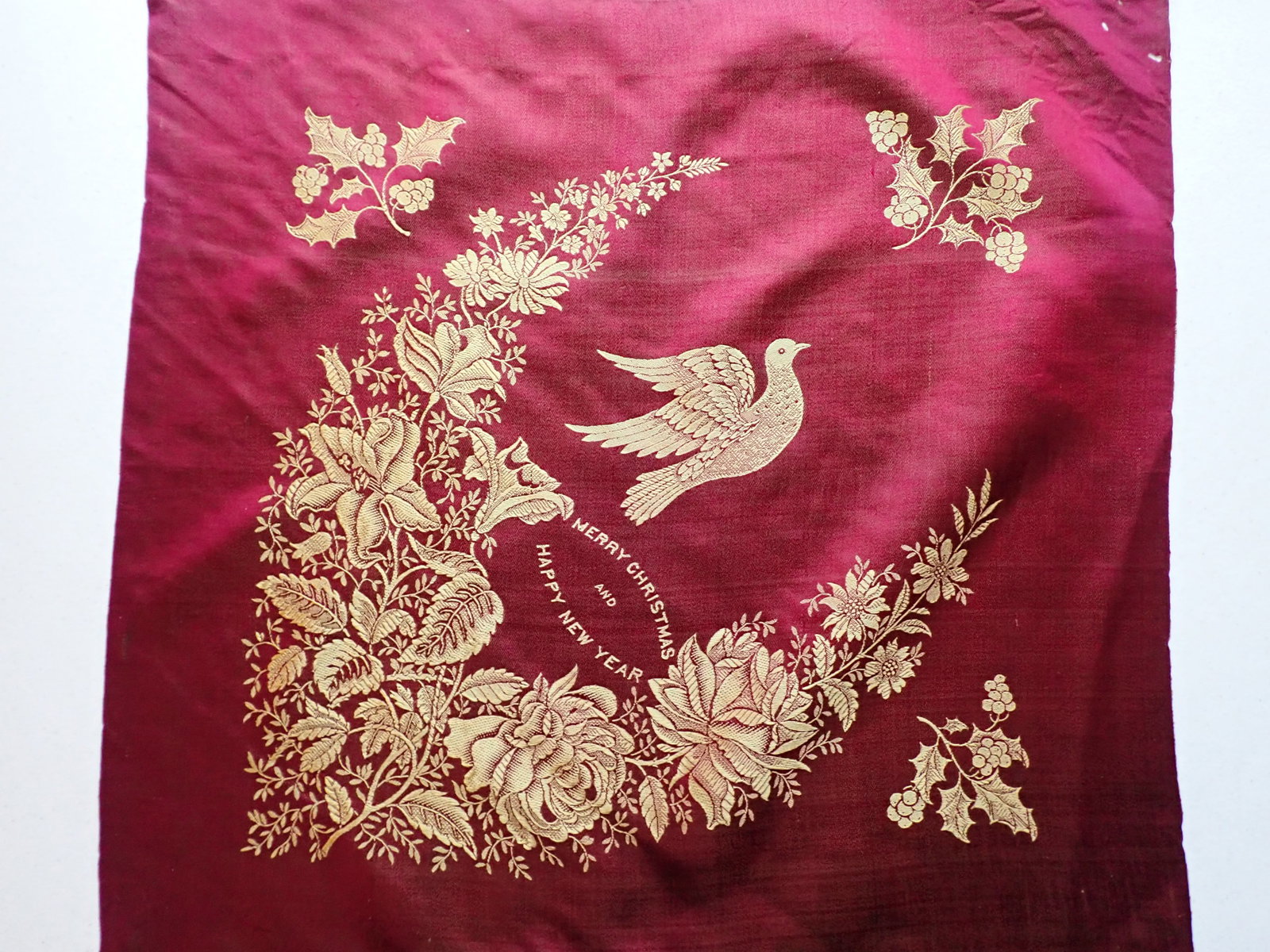 Vintage Merry Christmas and Happy New Year Silk: Maroon with Gold Leaf Design. Has 3 holes in one corner and a little overall wear. 21" x 21"