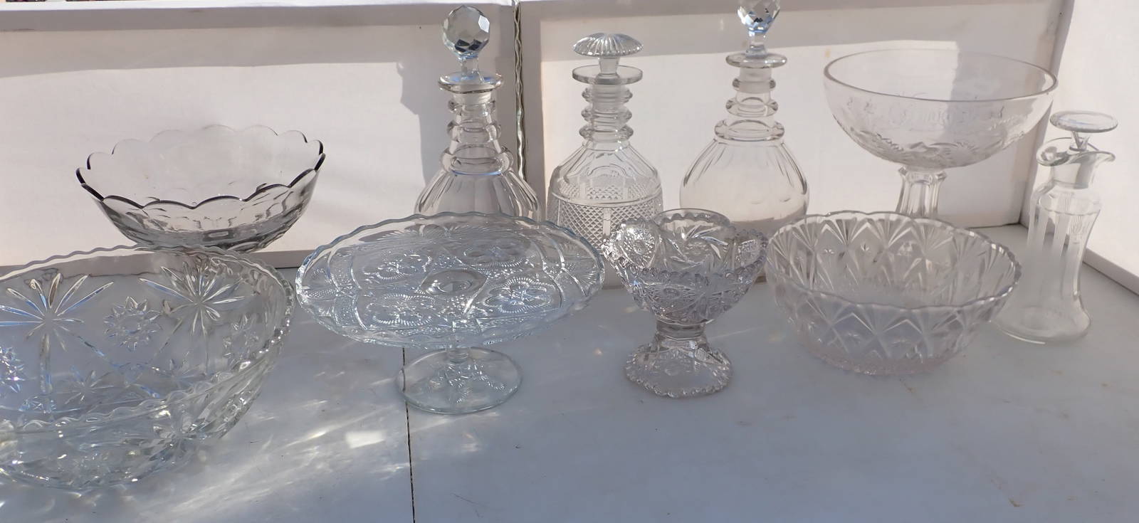 Decanters, Oil & Vinegar Cruets, Cake Stand, & Other Glassware Auction