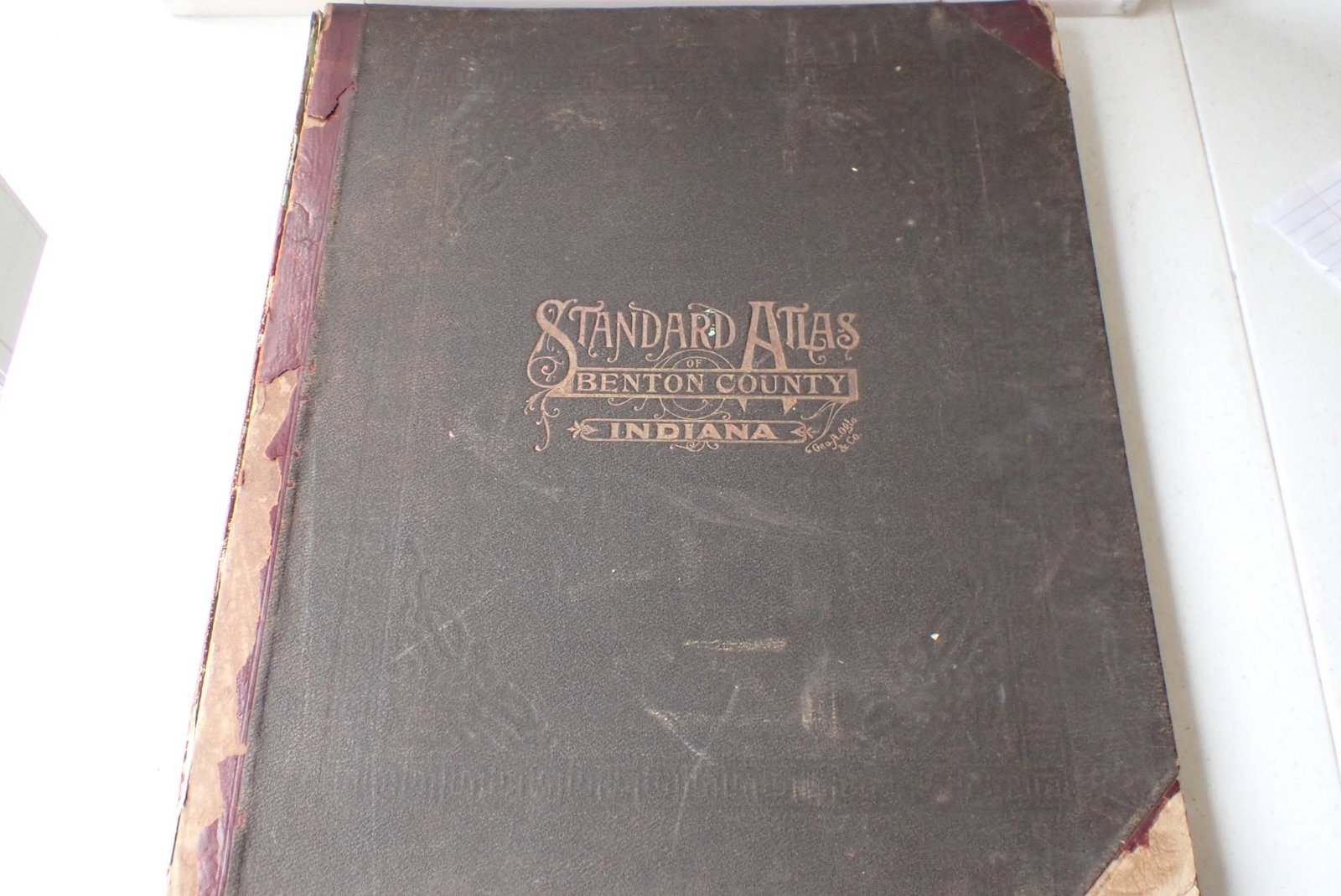 1909 Atlas of Benton County Indiana: Standard Atlas of Benton County Indiana by George A. Ogle & Co, Chicago. Maps of the Villages, Cities and Townships of the County. Cover has wear with loose binding. Pages have little wear with some s