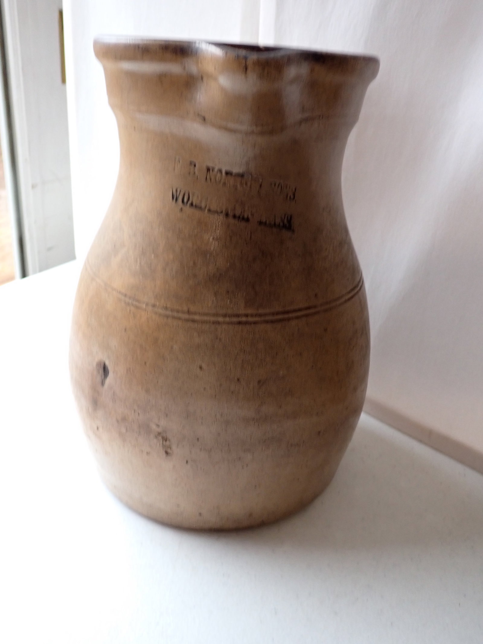 F.D. Norton & Sons Worcester, MA Stoneware Pitcher: Has a little wear with 2 chips. 10 1/2"