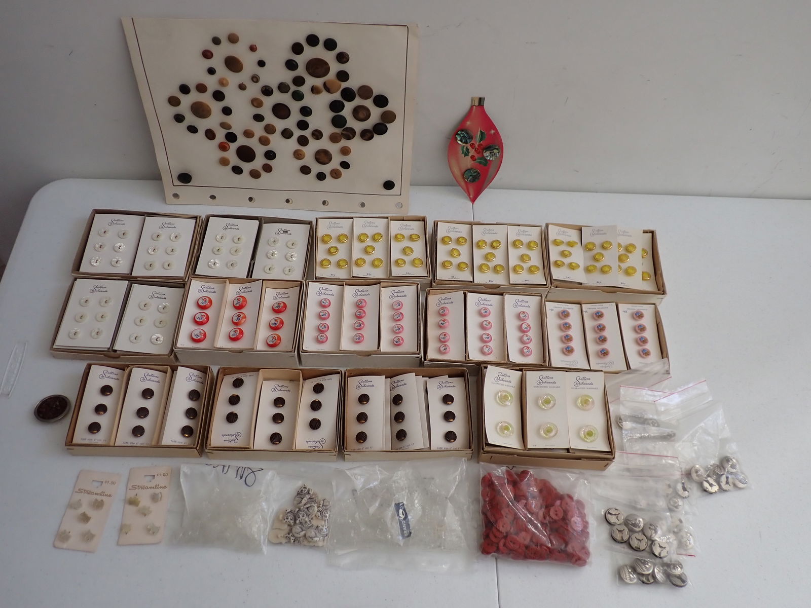 14 Buttons by Schwanda on cards and Other Buttons: Scottie Dogs, Button covers, Glass Buttons, Cats, Oyster Shells, etc. Western Germany Buttons by Schwanda