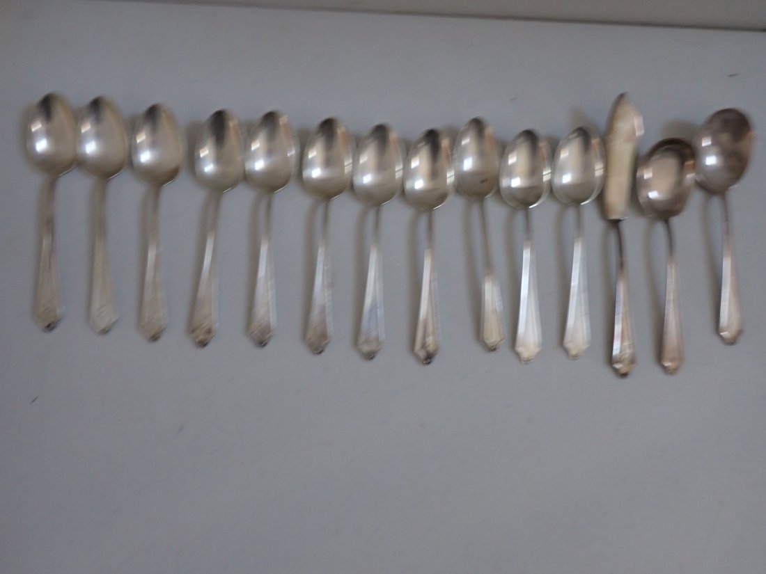 International Sterling Silver Flatware: 11 Teaspoons – 8 are monogrammed. Soup not monogrammed. Serving knife monogrammed. 11.9 troy ounces excluding knife.