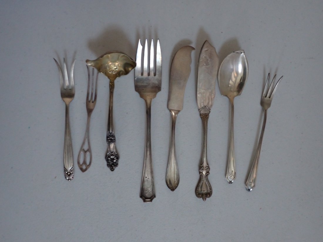 Serving Spoon. Ladle, Forks & Knives: Some have residual plastic wrap. 4.2 Troy Ounces excluding knives. Knives are 2.4 Troy Ounces.