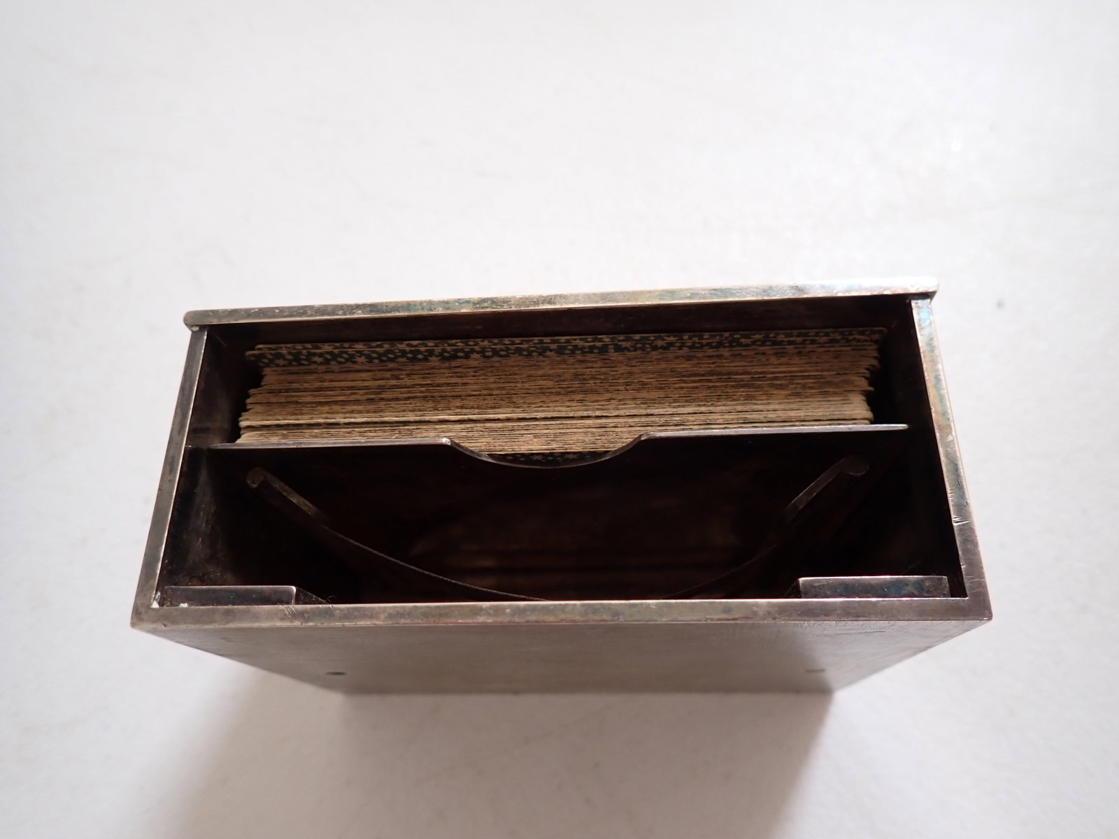 Metal card dealing device w/ cards: Metal Spring loaded devise cards are placed inside and can be easily dealt. 4" x 3" x 1 3/4" high