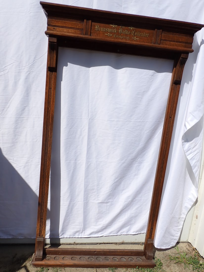 The Brunswick Balke Collender Company Oak Pool Cue Rack: 61" x 34 1/2". Good Condition