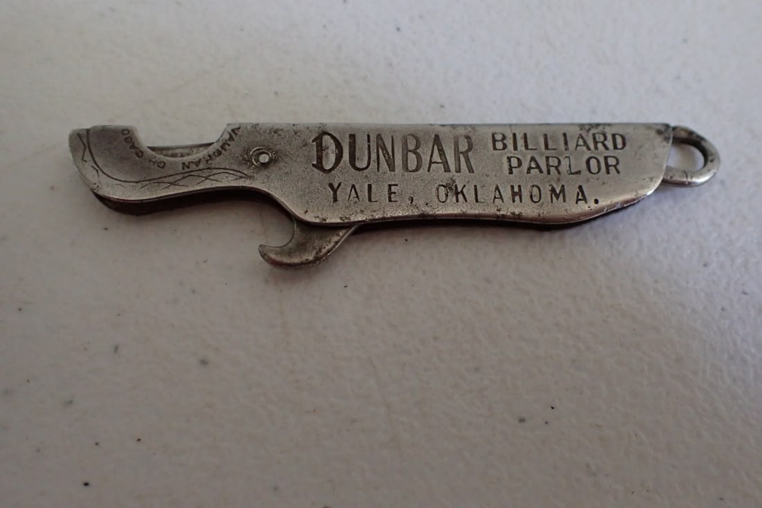 Dunbar Billard Parlor, Yale Oklahoma Cigar Cutter: One side marked Dunbar Billard Parlor, Yale Oklahoma Opposite side marked Cigars, Tobacco, Cold Drinks. Cutter does not move. 3 1/4"