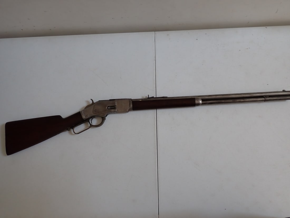 Winchester .38 Caliber Model 83 Repeating Antique Rifle: Marked Winchester Repeating Rifle New Haven, CT King's Improvement - Patented - March 29, 1865 - October 16, 1830. Trigger mechanism works. Light Ware. 43" Length. 23 1/2" Barrel.