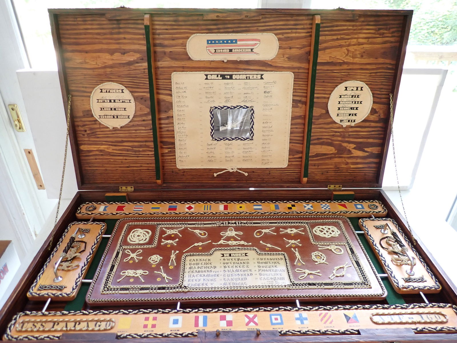 Navy Cruise Folk Art Box from The USS Papago (ATF-160): Beautifully Designed Box with 20 Different types of Maritime Knots made from String along with Anchors. There is a key listing the different types of Knots. Painted Nautical Flags. Has Edward Sanderso