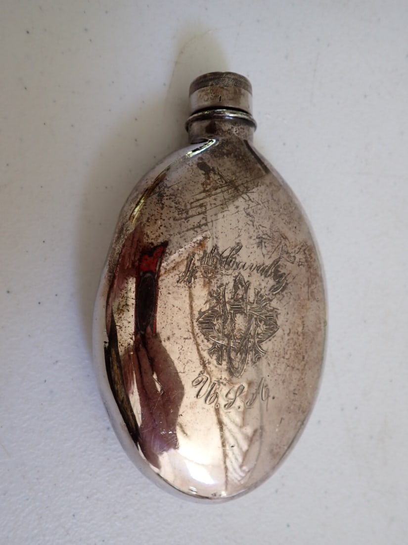 4th Cavalry USA Silverplate Flask: Silverplate corked screw top flask marked 4th Calvery USA with monogrammed design. Has small dents 5"