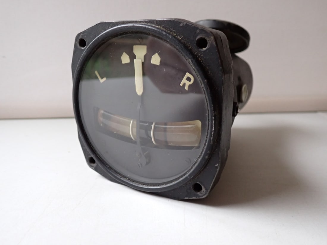 World War II era Aircraft Turn and Bank Indicator: Pioneer Instrument AN5820-I. Serial Number: AF-43-100300. 5" High.