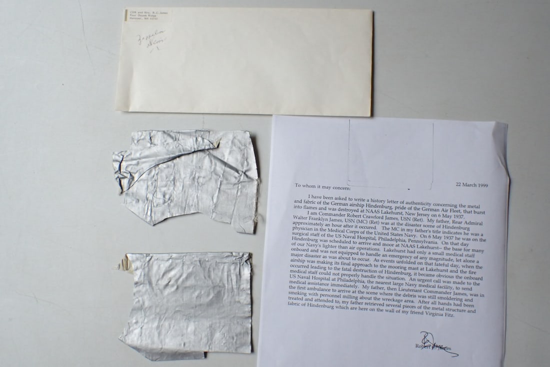 Fabric from the Hindenburg Zeppelin with COA: Pieces of Fabric from the Hindenburg Disaster. Accompanied by 1999 Letter of Authenticity from Navy Commander Robert James. James states that his father Rear Admiral Walter Franklyn James was rushed f
