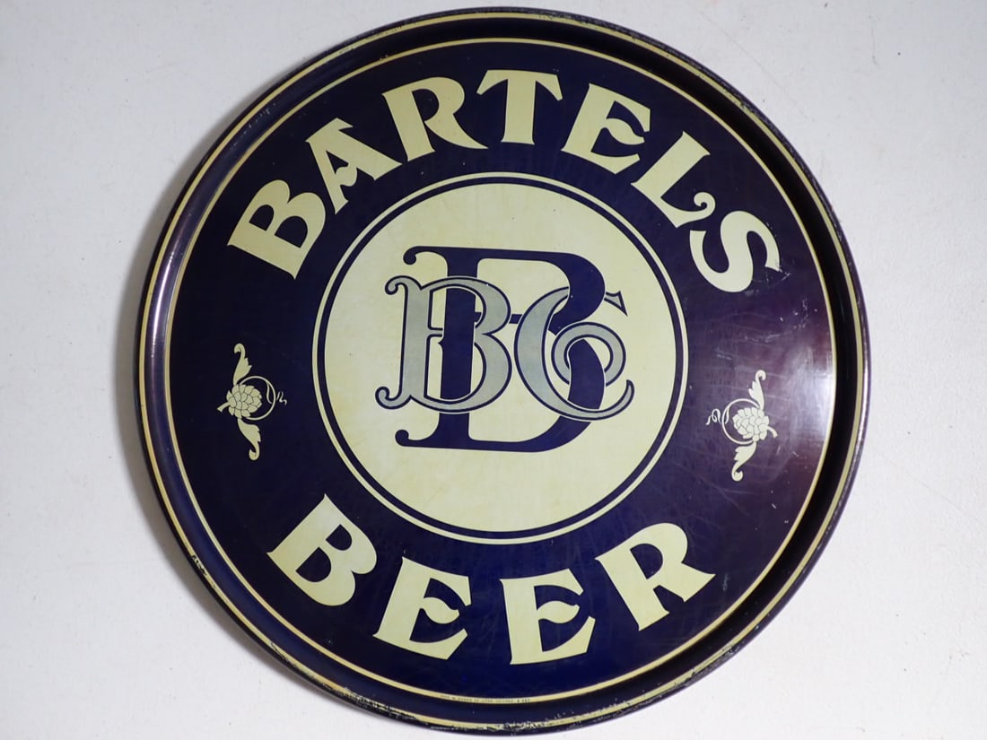 Bartels Beer Round Advertising Sign: Round Bartels Beer round advertising sign. Marked Chas. W. Shonk Co. Litho. Chicago. B 283. Some wear on sign and scuffing on edges 18 1/2"