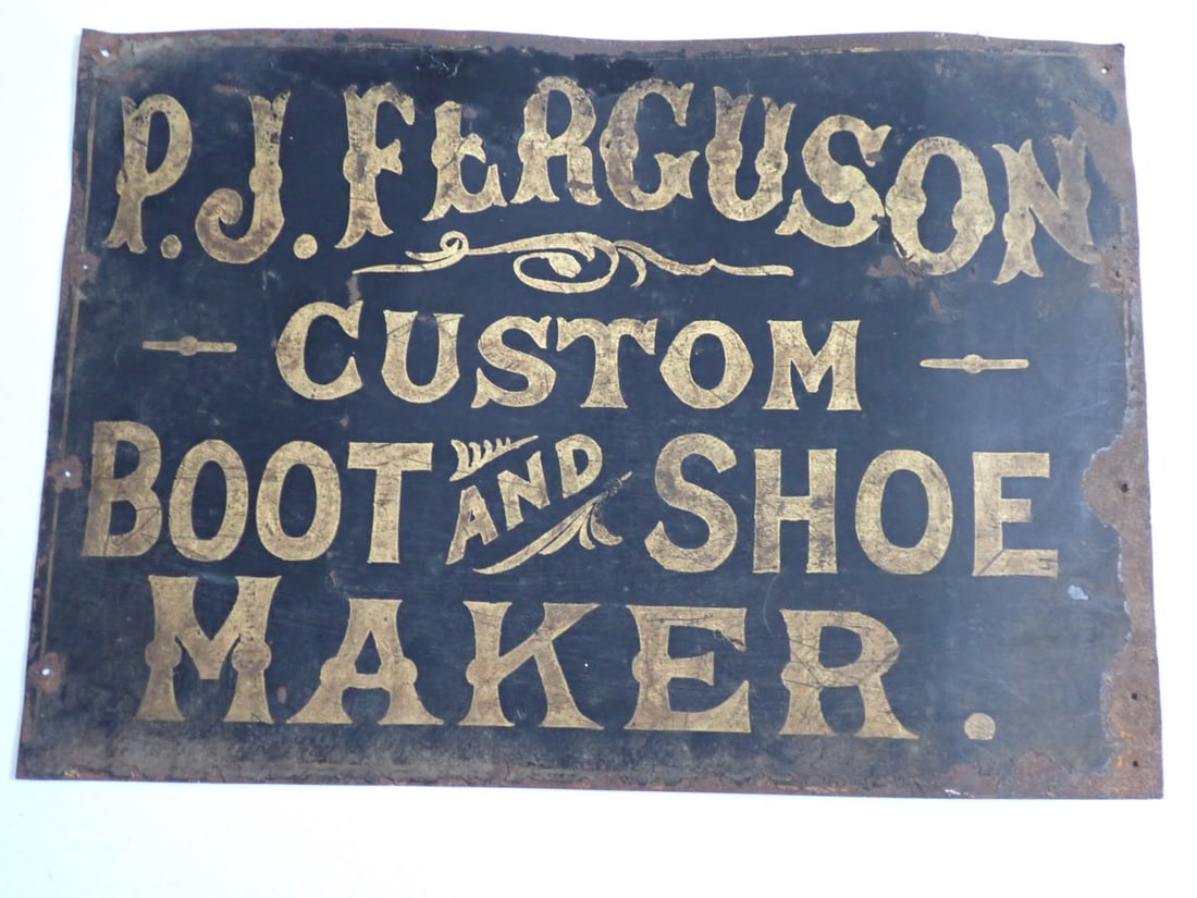P.J. Ferguson Custom Boot and Shoe Maker. Tin sign: Gold leaf paint. Some rust around edges and rust on reverse. 14" x 20"