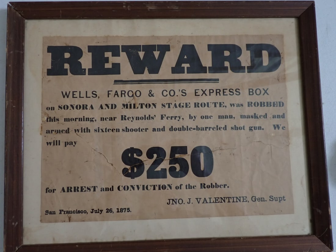 Wells Fargo Stagecoach Robbery Reward Sign: Broadside paper Poster "REWARD Wells, Fargo & Co.'s Express Box on Sonora and Milton Stage Route, was Robbed this morning, near Reynolds' Ferry, by one man, masked and armed with sixteen shooter and d