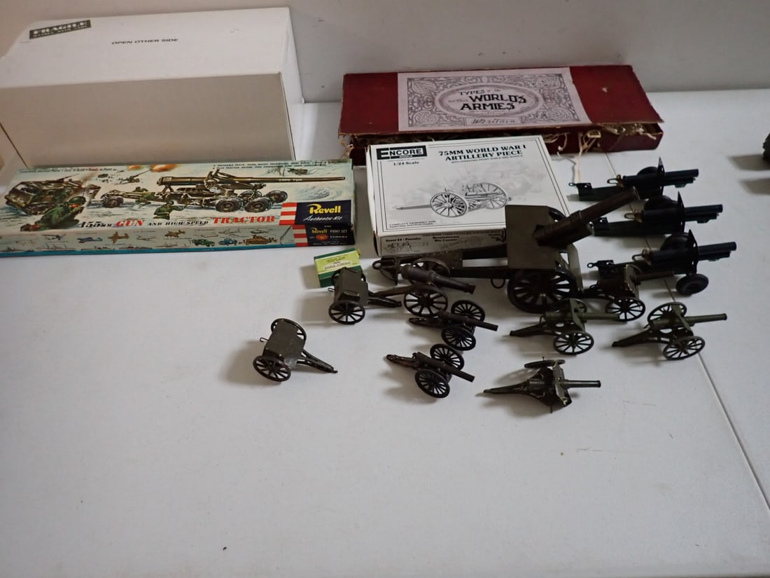 Britains Toys Soldiers, Metal Artillery Guns, Danbury Mint Jeep, etc.: Britain Type of the World Armies Figures as pictured. Box has wera and missing flaps. 1 assorted Artillery Guns. (one missing wheel). 2 Caissons. Danbury Mint Jeep. Has one Gun. Another empty package.