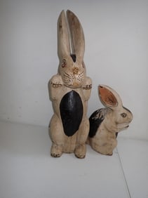 2 Carved wooden painted rabbits