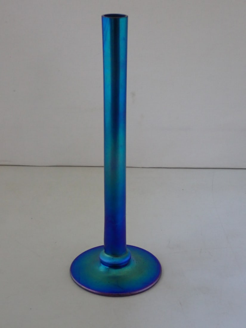 Steuben Art Glass Vase: iridescent blue aurene glass with ruffled rim. Marked Steuben Aurene 2556. 3" diameter x 8" high. No cracks or chips. Typical wear from use. Polished top rim.