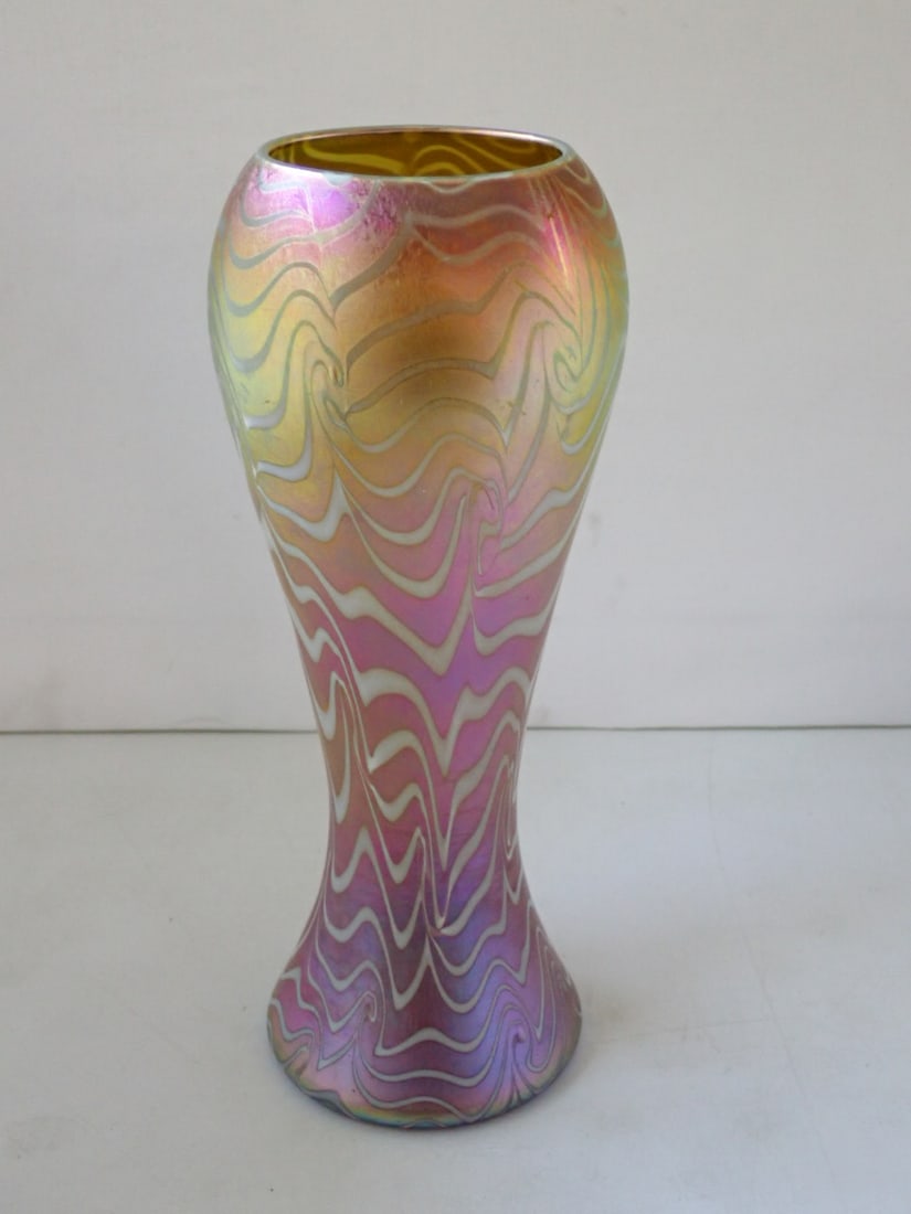 Durand Art Glass Vase: iridescent gold and white glass with pulled King Tut decoration. Marked with rectangular paper label, see Meschi p. 162, Fig. #14. 3 7/8" diameter x 9 7/8" high. Ground pontil mark. No cracks or chips