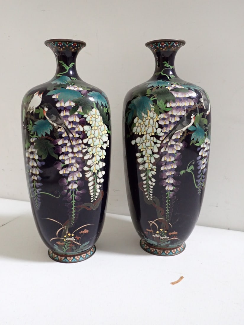 Pair of Asian hand painted Cloisonné wisteria vases: 12" 4 bowed sides 2 matching vases. Wisteria design. Top and base are round. Has some spidering of enamel.