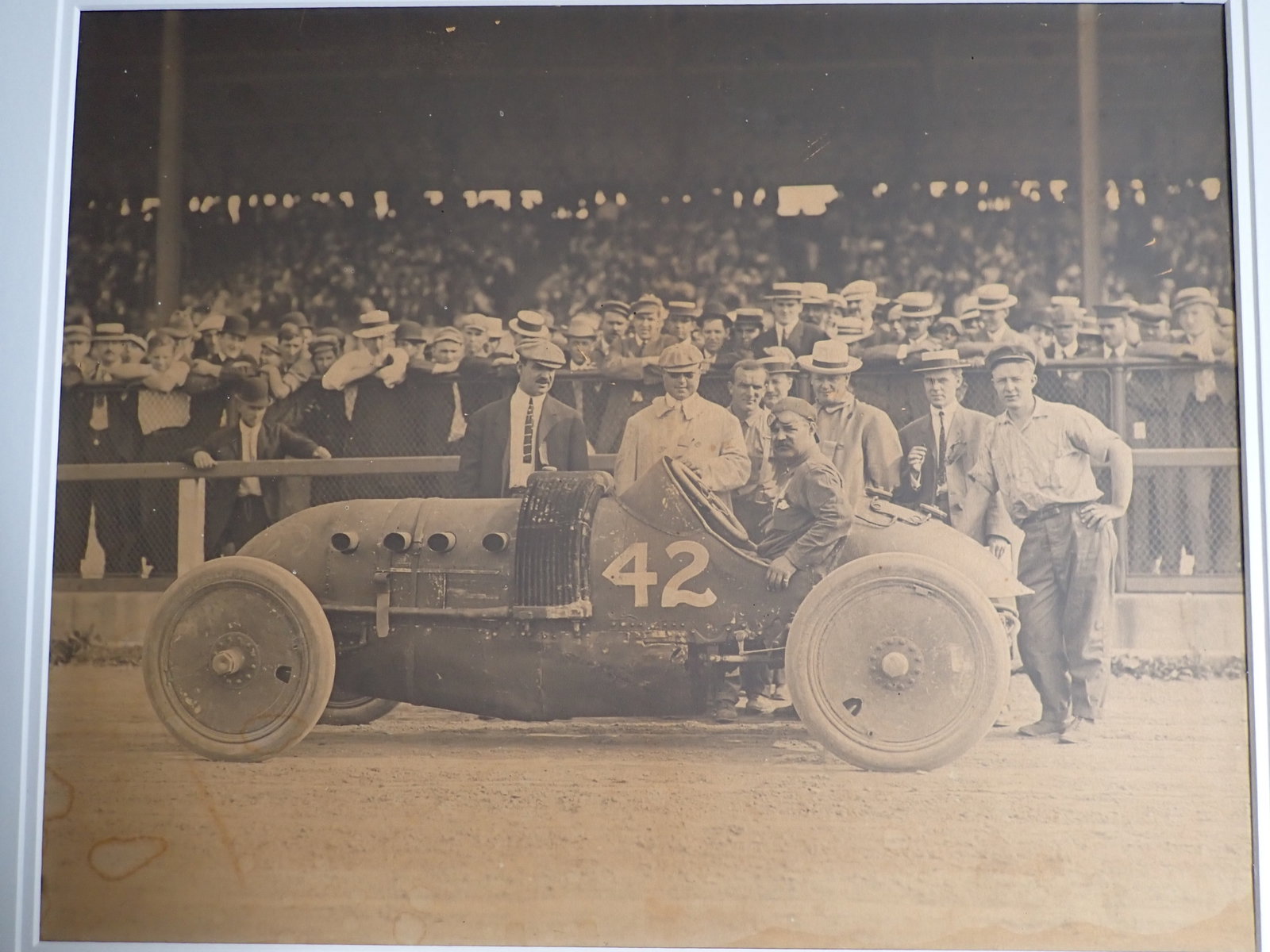 1913 Barney Oldfield Indianapolis 500 Racer & Land Speed Record: 1913 Original Photo with Raced Car Driver Barney Oldfield. Consignor's provenance identifies individuals behind car as Walter Chrysler, Louis Chevrolet and William Durant along with C.L. Whiting (Buic
