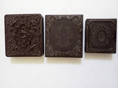 Ambrotype and Two Tintypes in Gutta Percha Cases.