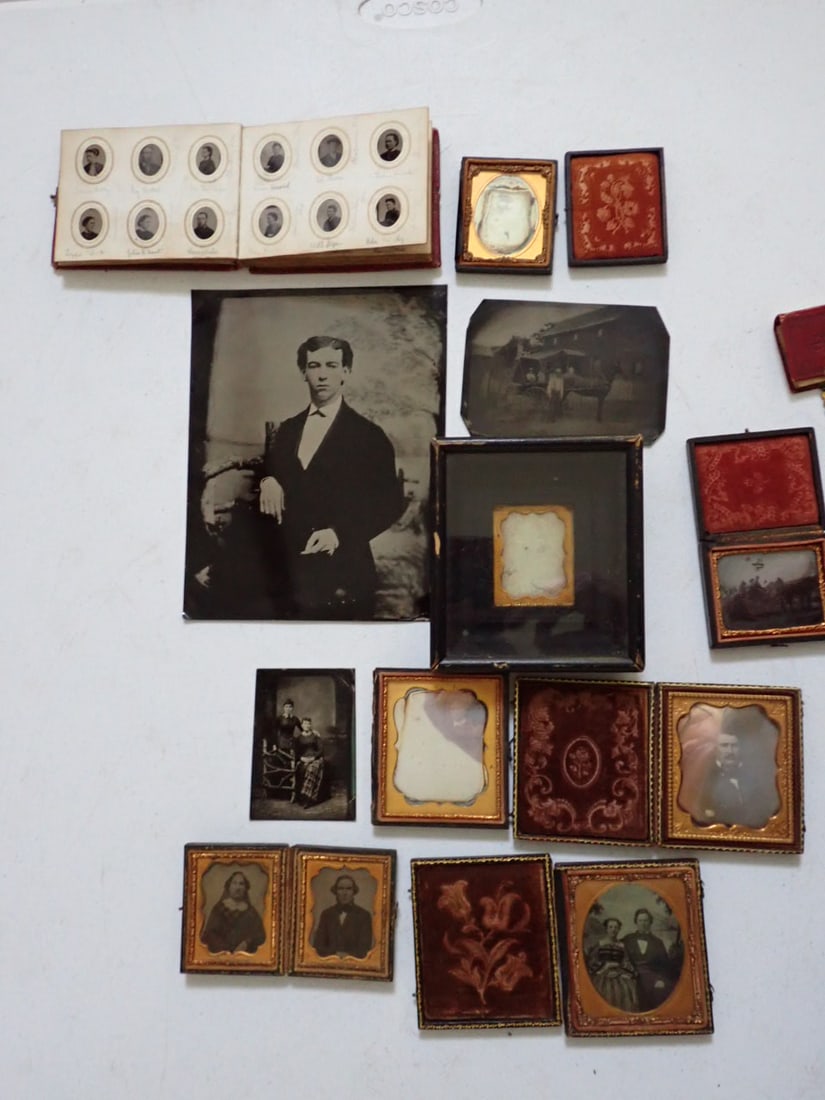 Daguerreotypes, Ambrotypes and Tintypes: Photos of Animal, Pairs of Woman, and Other People, Also Album of small identified people. The smaller album has 8 pictures and the larger album has 144 pictures. 24 double sided pages of 6 photos eac