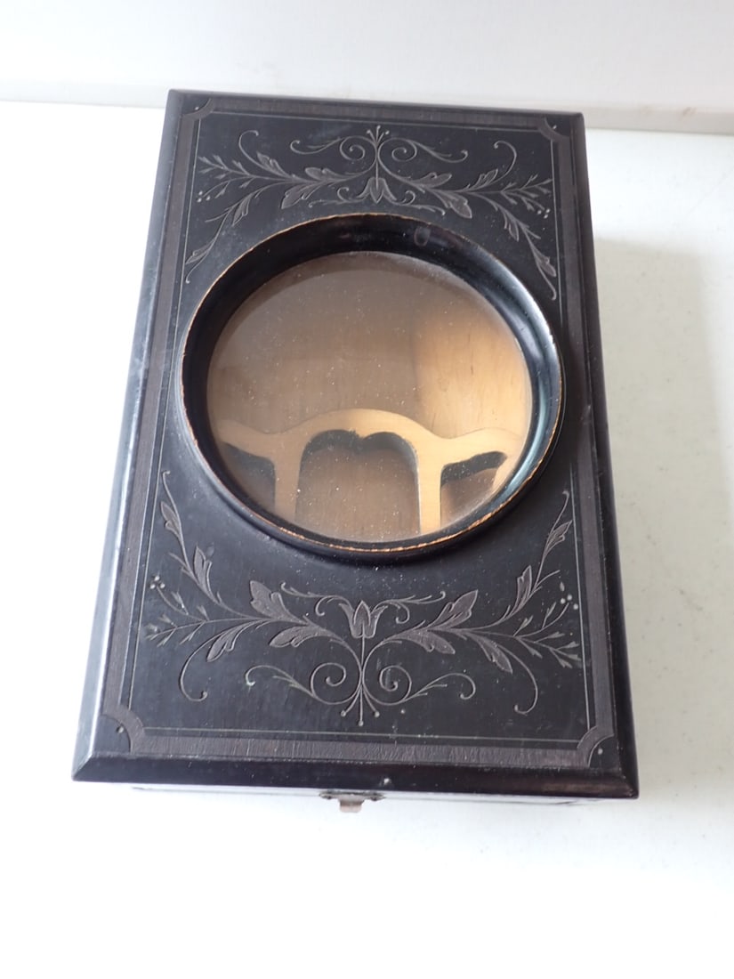 Graphoscope Antique Photo Viewer: Black with Scoll Design around Lense. When shut, measures 7" x 11" x 3 1/4"