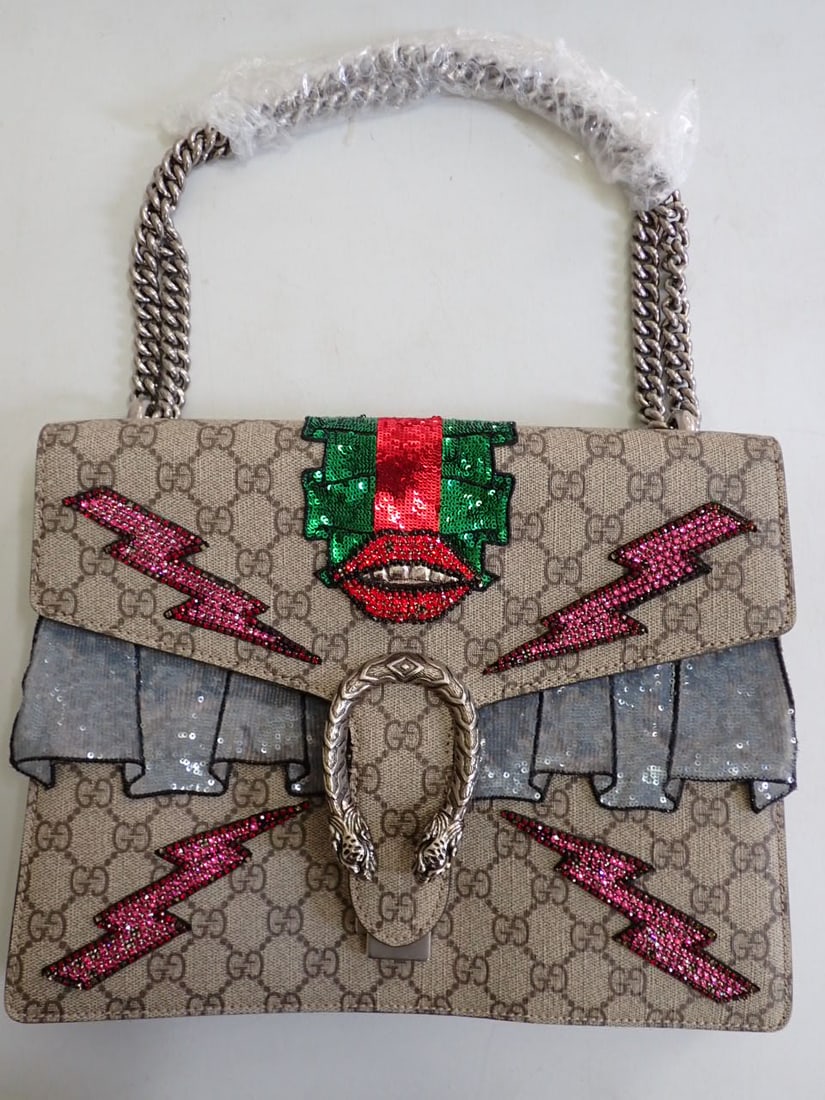 GUCCI Dionysus Embellished Handbag: Gucci Dionysus Bag Embellished GG Coated Canvas Handbag-Exterior Material: Canvas Coated-Interior Material Suede. Hardware Antique Silver . Good Condition w/ original bag. Width 11 1/2" x Height 8 3/4
