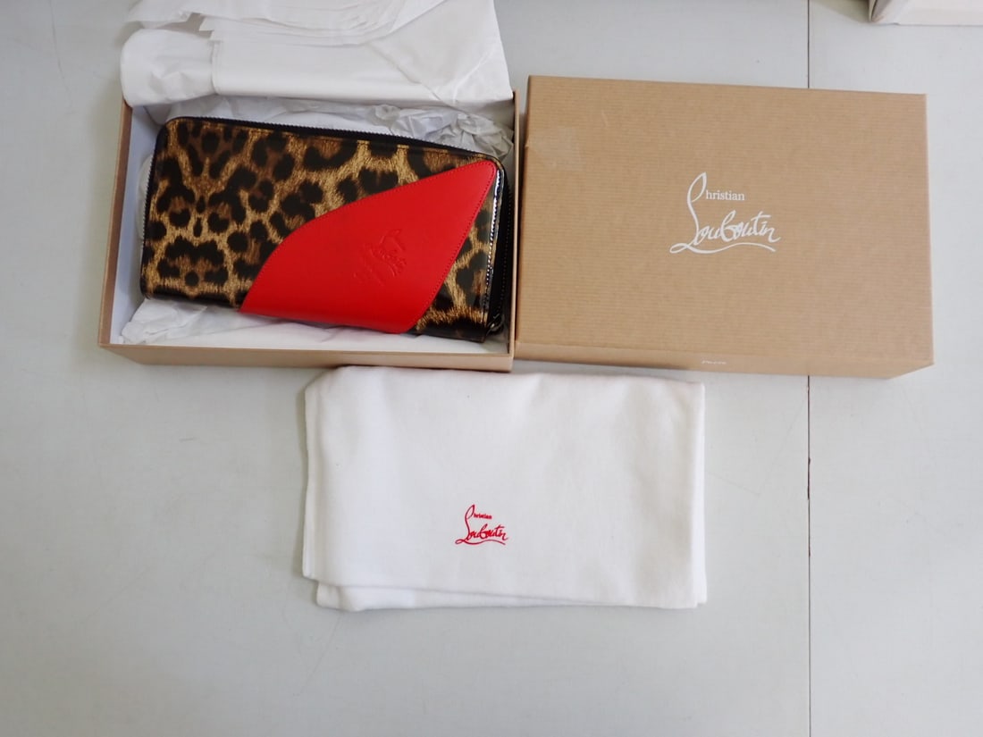 Christian Louboutin Wallet: LOUBOUTIN wallet with original storage bag and box. Leopard print and Red color. Excellent condition (see photos). Width 7 3/4" x Height 4"