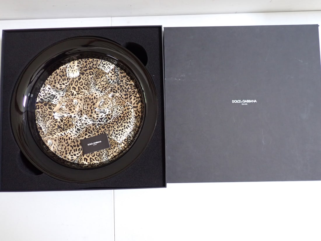 Dolce & Gabbana Casa mint in box Leopard round tray: 16 1/2" Mint in box, Dolce & Gabbana Leopard tray. Black in Color Receipt for 1,345. Box has some scratches and torn corner, plate is in mint condition.
