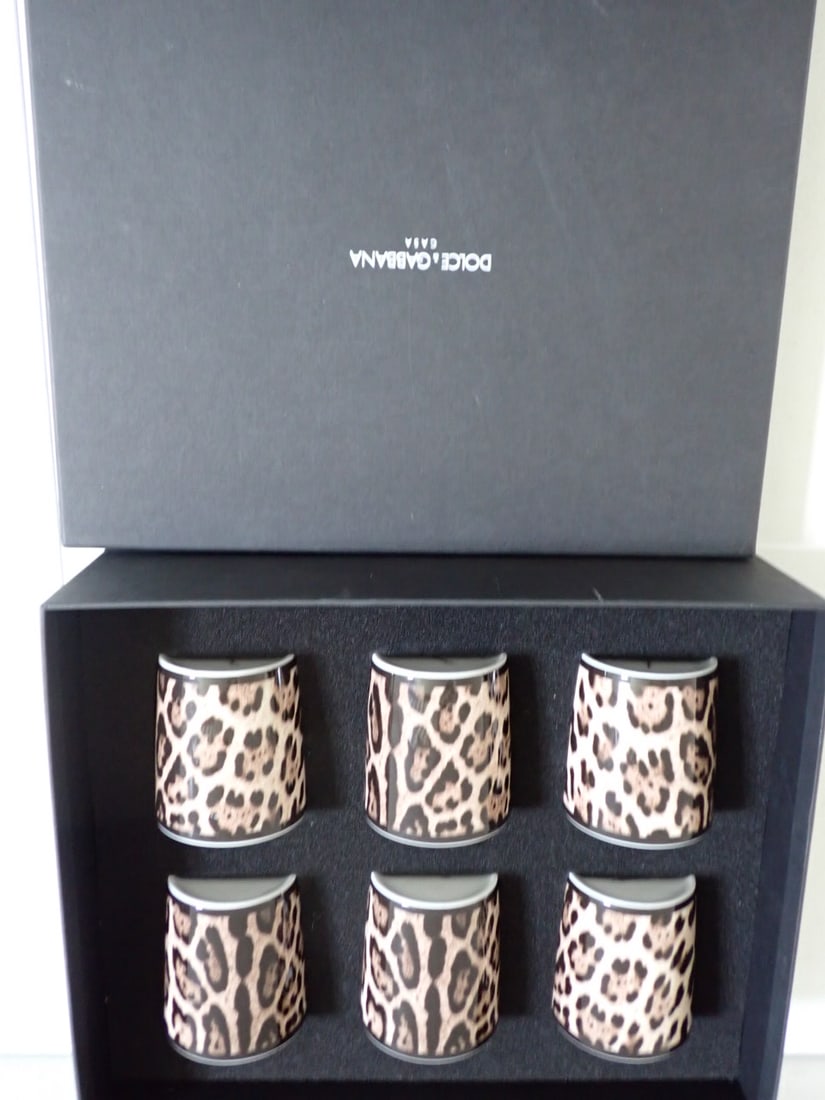 Dolce & Gabbana Casa mint in box Leopard 6 glasses: 6 leopard print glasses mint in box. Glasses measure 3 1/2". Box has some scuffing in good condition Receipt for 994.