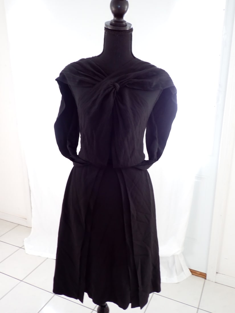 Gucci Black halter style dress. Size Euro size 40: Black halter style cocktail dress Euro size 40 - Zipper gets stuck at bottom but works. Height to top of Mannequin is 68".