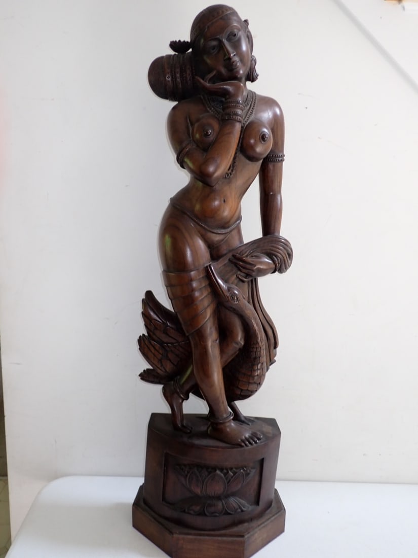 East Asian Wood Large Nude Woman with Goose Statue: Figure top and base are carved from one pieces of wood, figure maybe Hindu Goddess, Parvati, 39 1/2" tall- figure is 30" tall, intricately carved wood with minor splitting from age, partial label on b