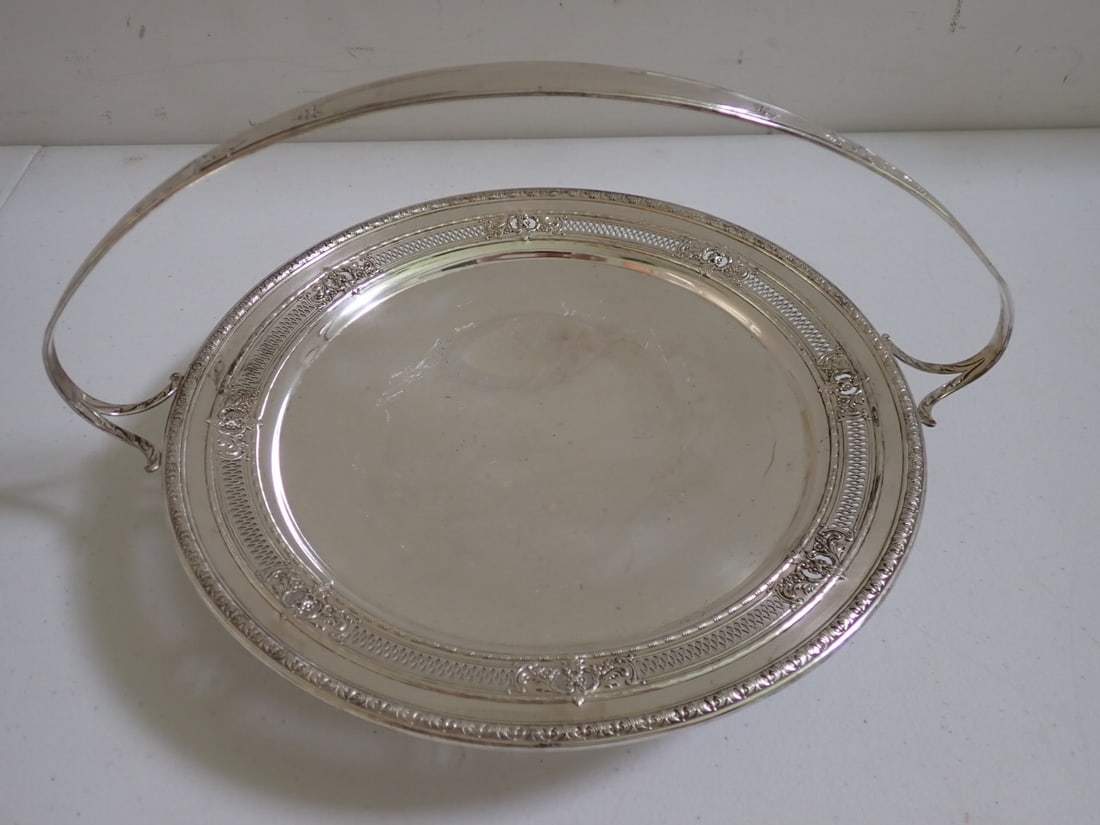 Sterling Silver J S Co. Reticulated Brides Basket: Has Ornate Reticulated Design with Embossed Design on bowl and handle. Marked J S Co. Sterling H15-1A. Has a little scuffing but overall good condition. 10" diameter. 6 1/2" High - 13.6 Troy Ounces
