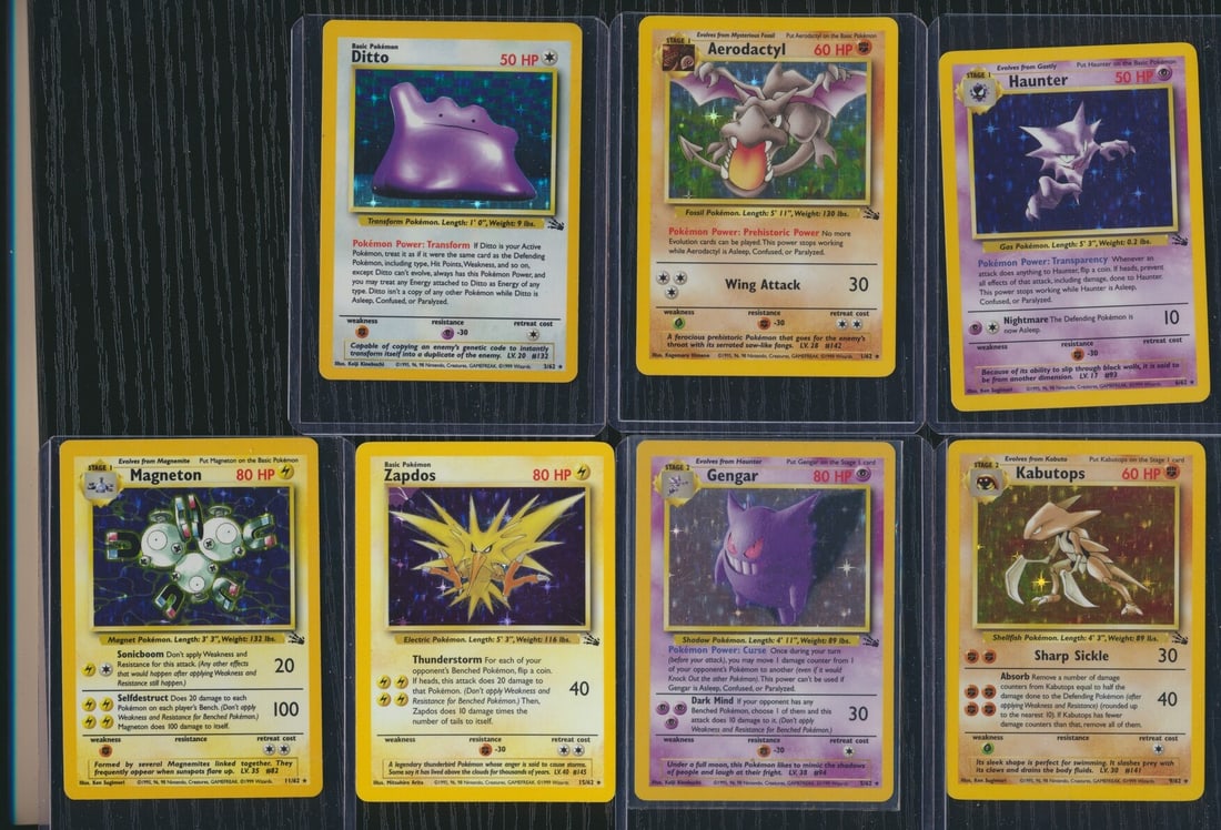 1999 Pokemon Fossil Holos 1, 3, 5, 6, 9, 11, 15: Aerodactyl 1/62, Ditto 3/62, Gengar 5/62, Haunter 6/62, Kabutops 9/62, Magneton 11/62, Zaptos 15/62. 7 Hologram Cards from same collector as graded cards. See scans for condition.
