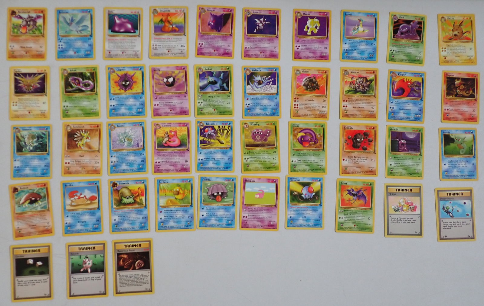 1999 Pokemon Fossil Non Holo Near Complete: 62/62 Set. Never played with. Same collector as graded cards