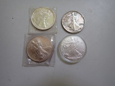 4 Silver Eagle Coins: 1989. 1991, 1998, and 2022