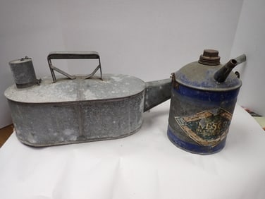 2 metal oil cans