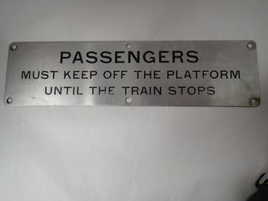 Passengers Keep Off of Platform Sign