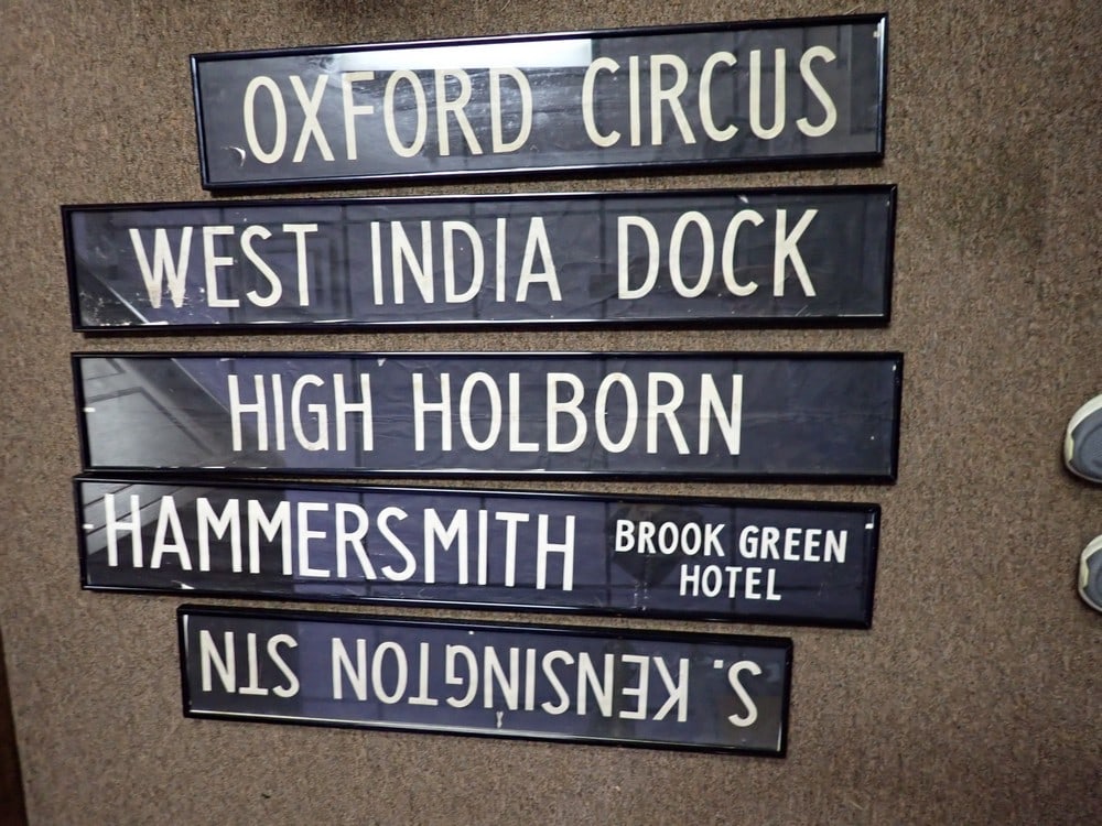 5 English Trolley Signs: Oxford Circus, West India Dock, Hammersmith Brook Green Hotel, High Holborn, S Kensington STN- 41 1/4" x 32 1/4"