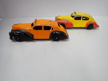 2 Vintage Metal Taxis