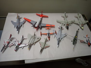 11 model airplanes and model helicopter